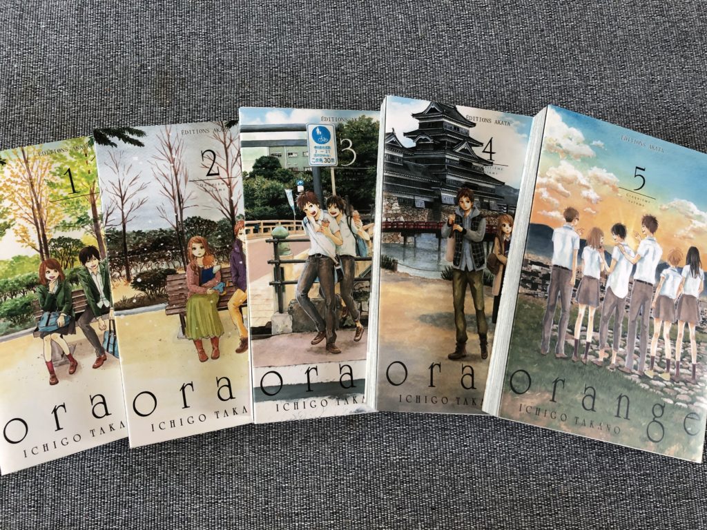 Les tomes un à cinq d'Orange d'Ichigo Takano
